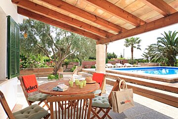 A table with an orange towel that says select on it