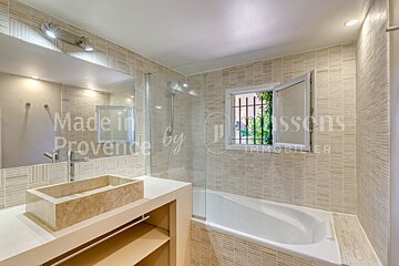 A bathroom with the words made in provence on the wall