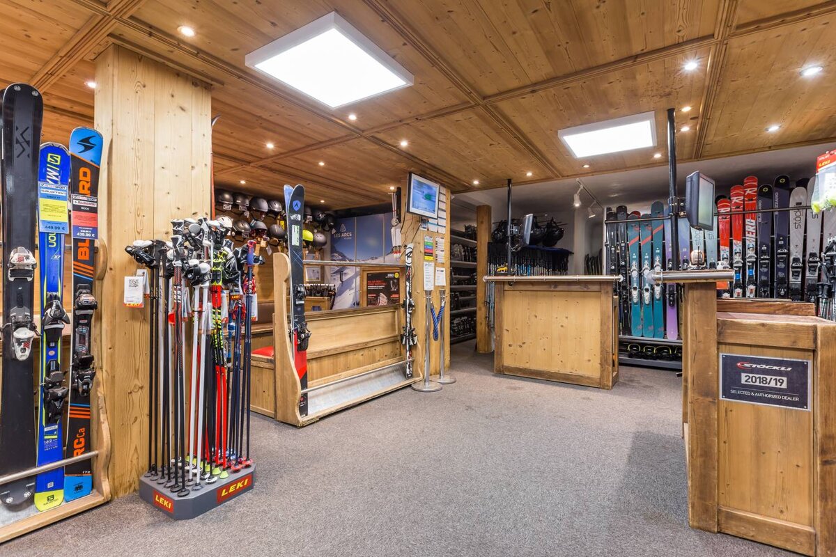 A display of skis and poles in a ski shop