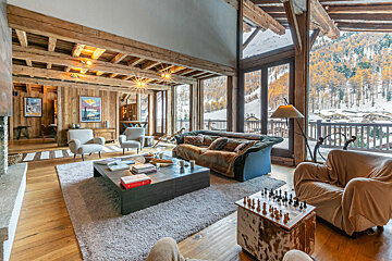 A living room filled with furniture and a fireplace