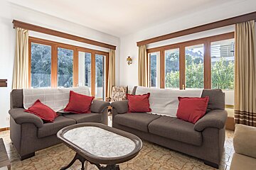 A living room with two couches and a coffee table
