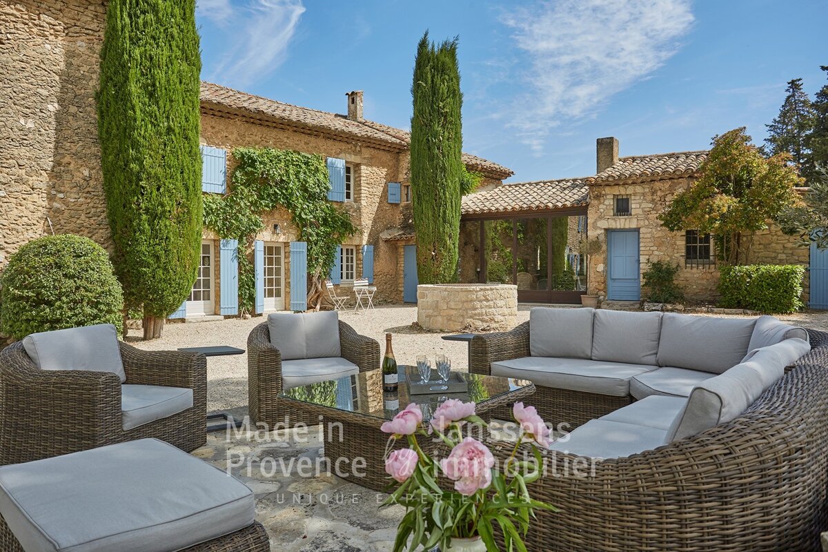 A patio with a couch and chairs made in provence