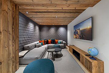 A living room with a couch and a globe