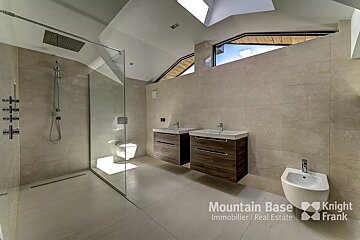 A bathroom with a knight frank logo on the bottom