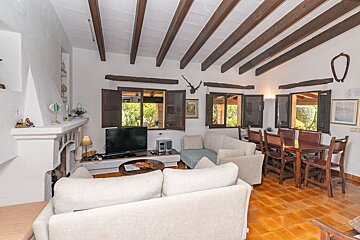 A living room with a couch and a television