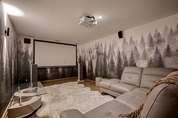 A room with a sauna and a steam room