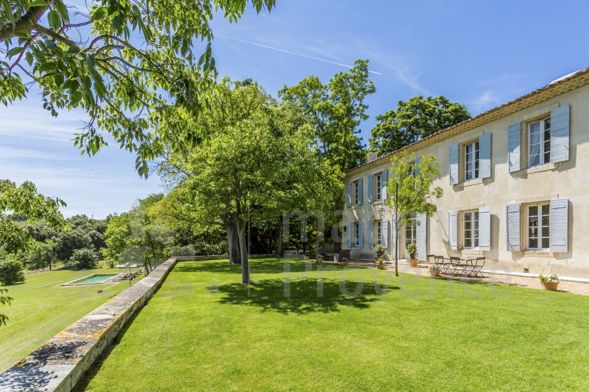 A large house with a large lawn in front of it