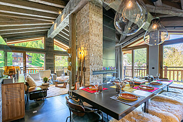 A living room with a couch and a table