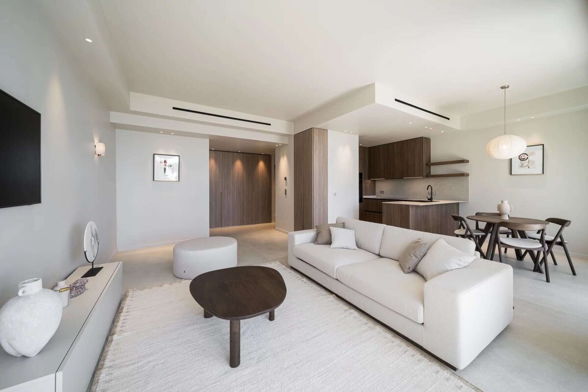 A living room with a couch and a table