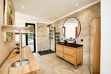 A bathroom with the words made in provence on the wall