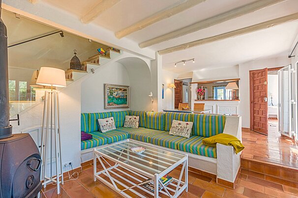 A living room with a couch and a coffee table
