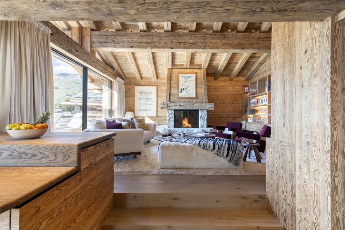 A living room with a fireplace and a couch