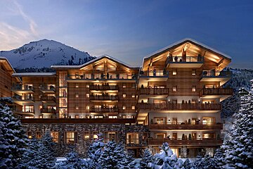 A large building with a mountain in the background