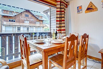 A dining room with a sign that says danger vtt on it