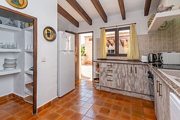 A kitchen with a refrigerator that says lg on it