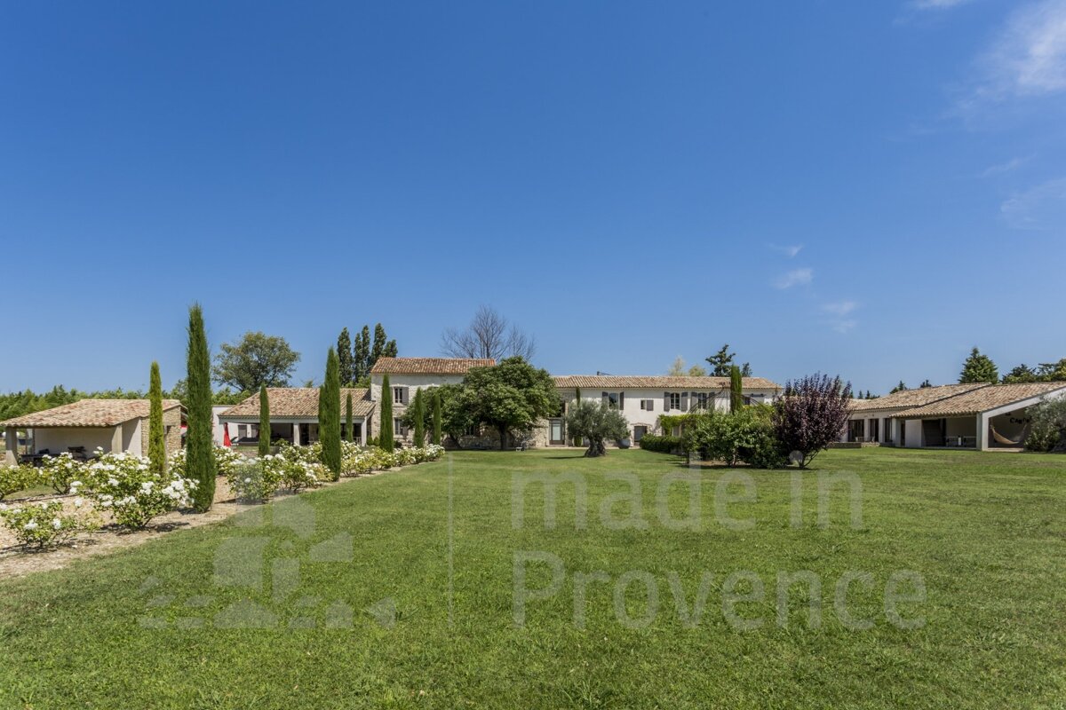 A large house with the words made in provence on the grass