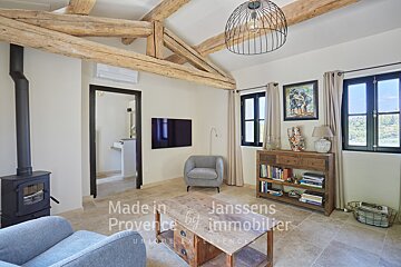 A living room with the words made in provence by immobilier on the wall
