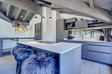 A kitchen with a smeg coffee maker on the counter