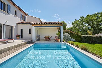 A large swimming pool with the words made in provence on the bottom