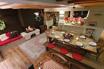 A dining room with a wifi sign on the wall