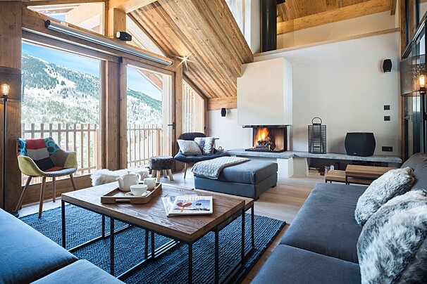 A living room with a fireplace and a couch