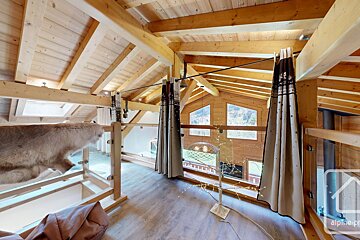 A picture of a wooden house taken by alpha-pr