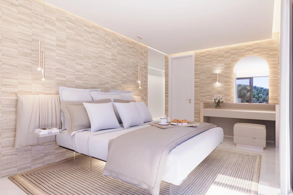 A modern, bright bedroom in neutral tones featuring a floating bed, textured walls, vanity desk, and warm ambient lighting.