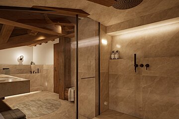 A bathroom with a walk in shower and a bathtub