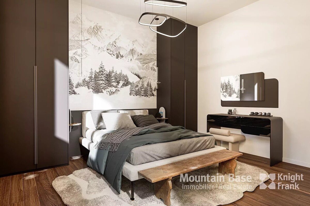 A bedroom with a bed and a bench with knight frank written on the bottom