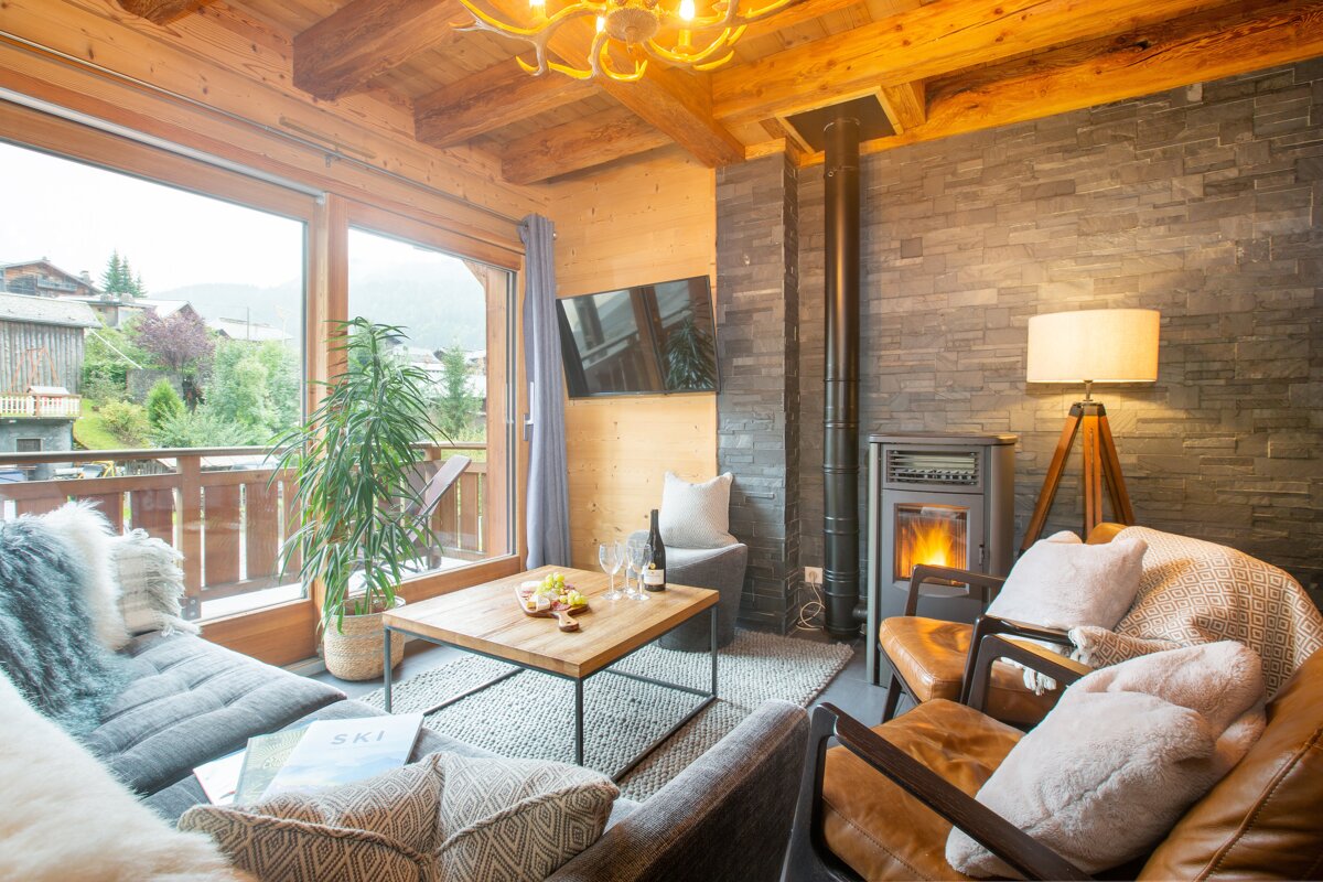 A living room with a book called ski on the coffee table