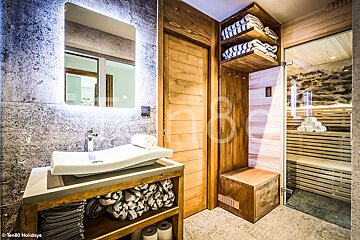 A bathroom with a sink and a mirror with the number 8 on it