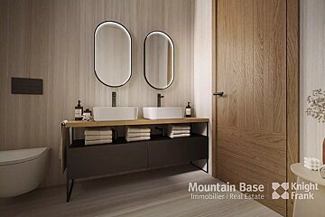A bathroom with two sinks and two mirrors from mountain base