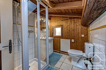A bathroom with alpine property written on the bottom