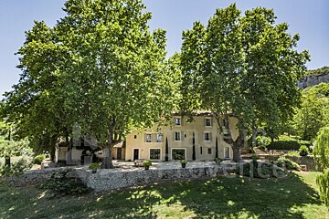 A large house with the word provence on the bottom