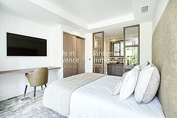 A bedroom with the words made in provence on the wall