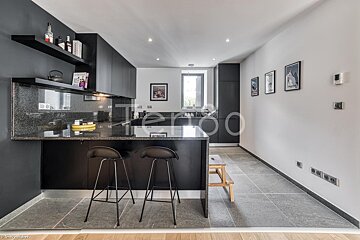 A kitchen with the word terroo on the wall
