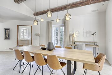 A dining room with the word made in on the wall