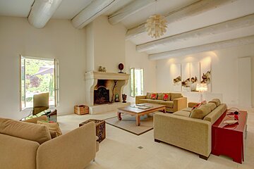 A living room filled with furniture and a fireplace