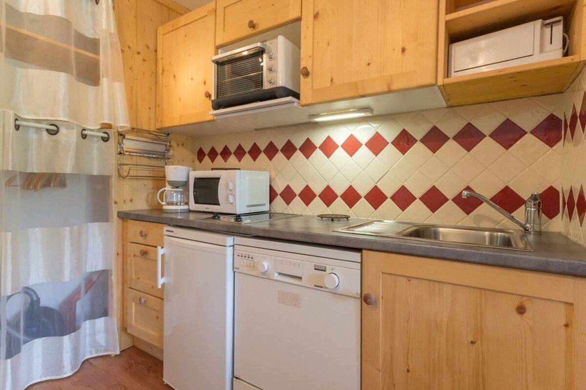 A kitchen with a dishwasher that says miele on it