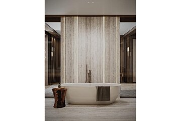 A bathroom with a bathtub and a wooden stool