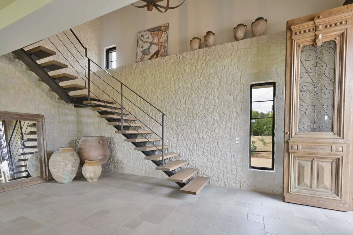 A staircase leading up to the second floor of a house
