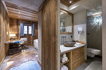 A bathroom with a sink and a toilet in it