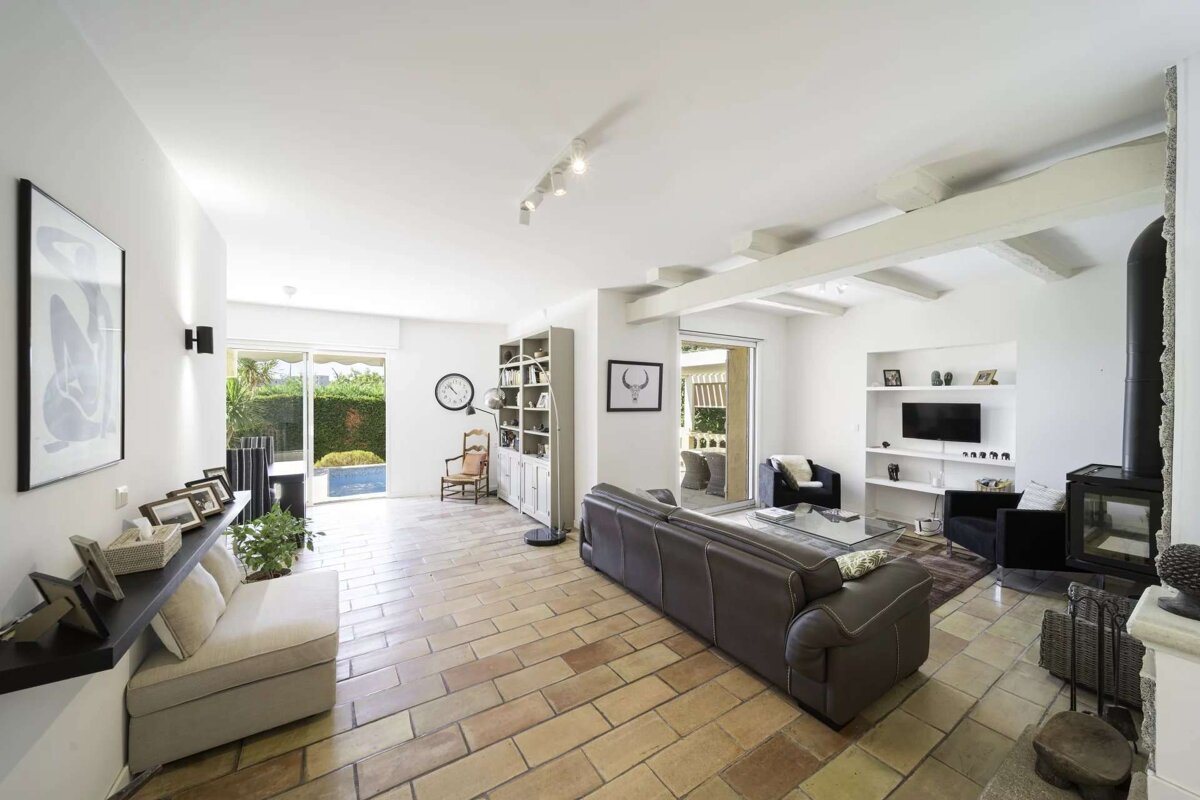 A living room with a couch and a television