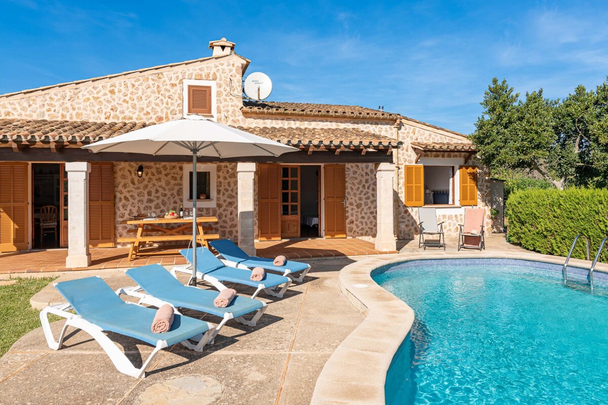 A house with a satellite dish on the top of it