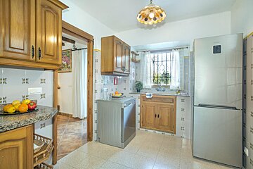 A kitchen with a samsung refrigerator and a dishwasher