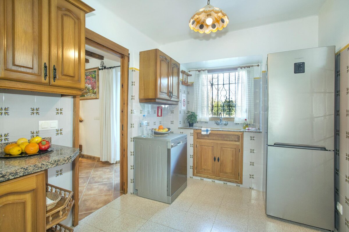 A kitchen with a samsung refrigerator and a dishwasher