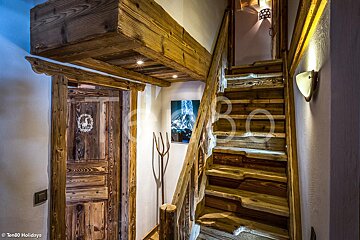A picture of a wooden staircase taken by ten80 holidays