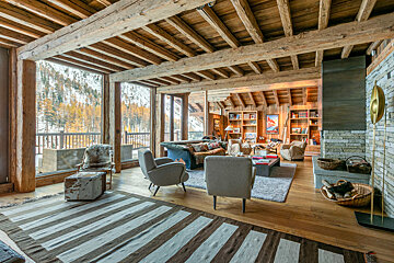 A living room filled with furniture and a fireplace