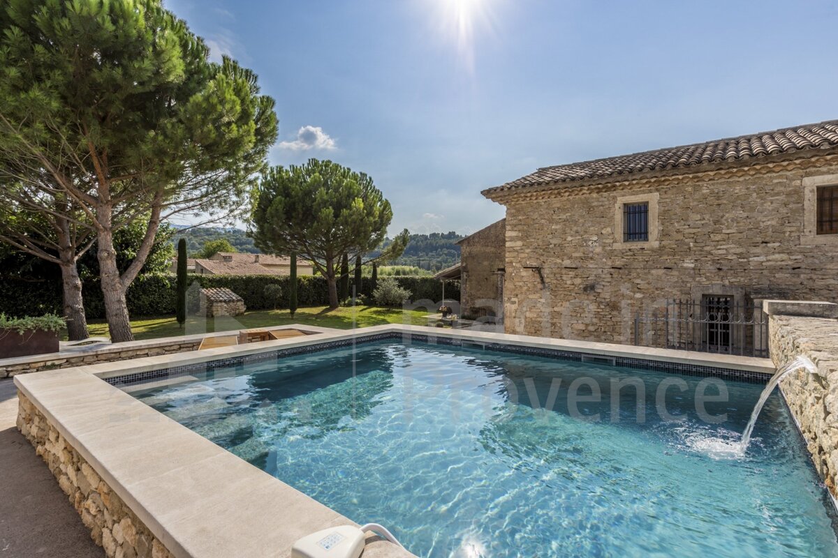 A large swimming pool with the word provence on the bottom