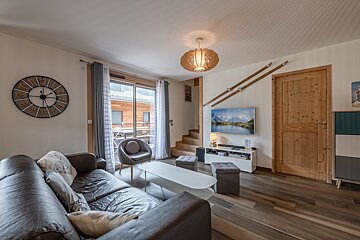A kitchen with wooden cabinets and a siemens oven